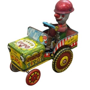 JUGUETE ANTIGUO PAYASO EN AUTO DE HOJALATA MARCA HALCÓN (VINTAGE)