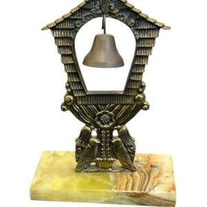 Adorno de mesa vintage con campana de bronce y base de marmol
